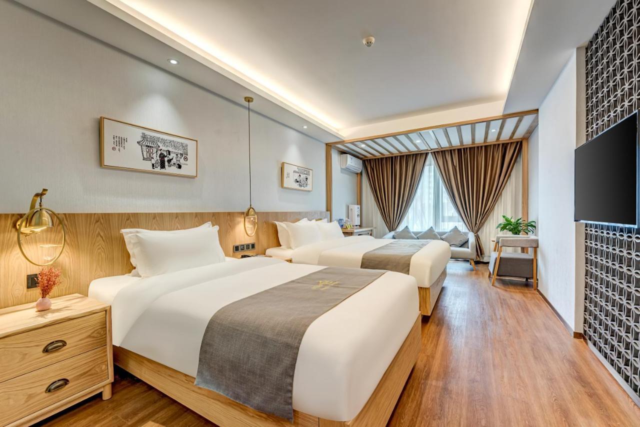 Happy Dragon City Culture Hotel: Central Beijing Stay with Local Insights Exterior photo